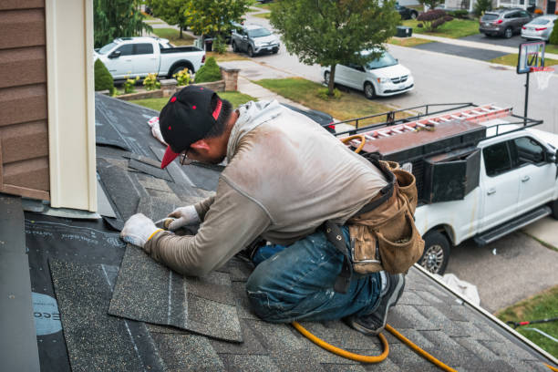 Professional Roof Replacement technician working in Winston, MT